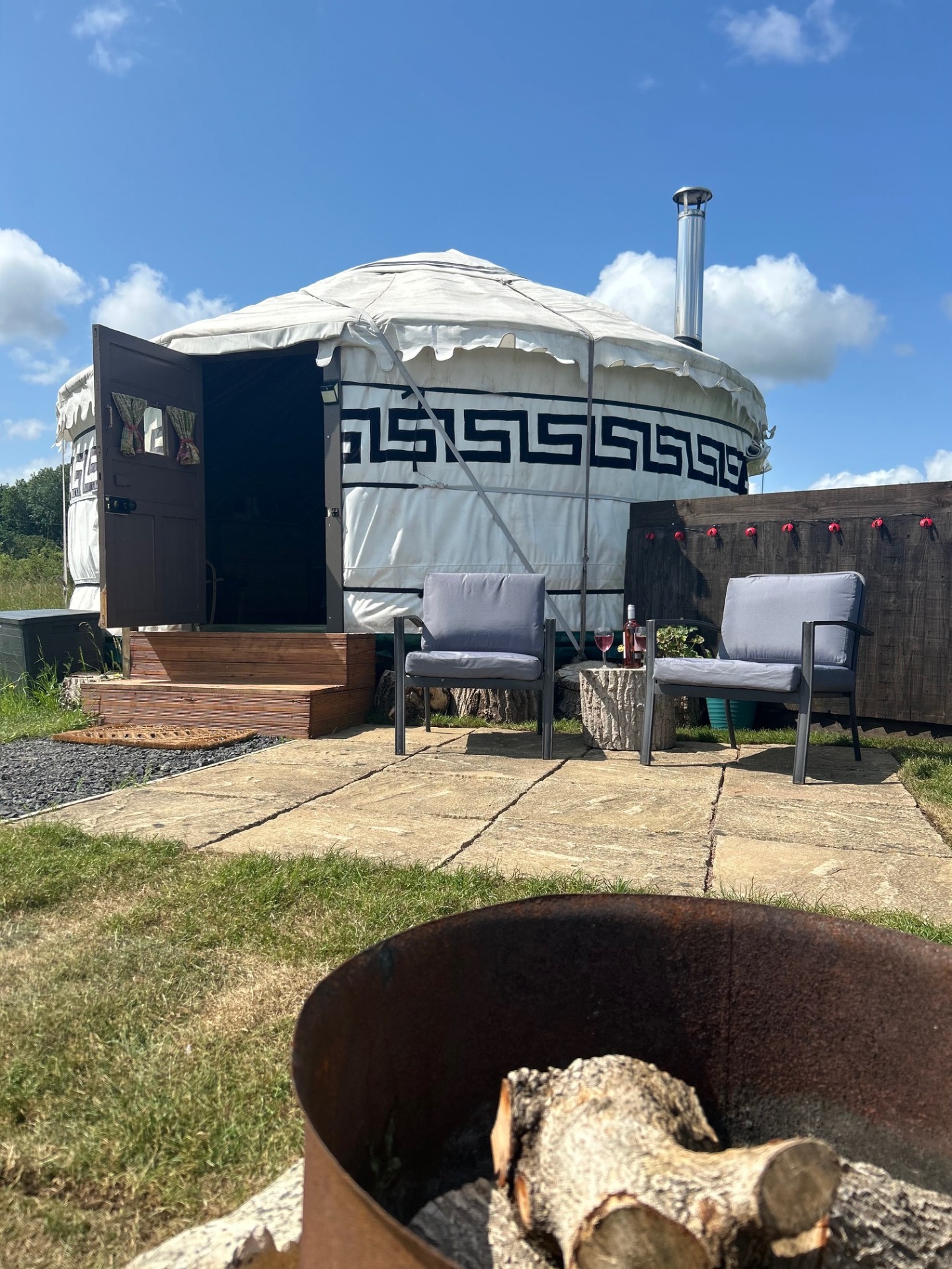 Primrose Yurt patio with firepit and BBQ area